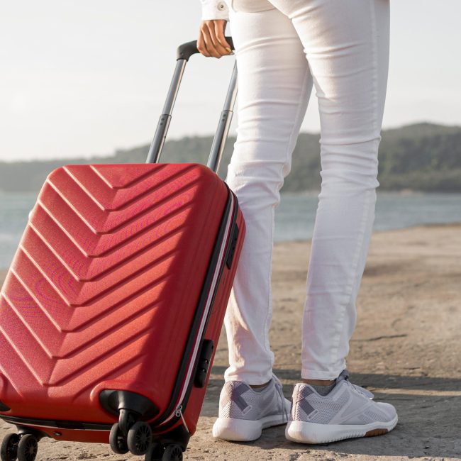 close-up-friends-traveling-with-luggage